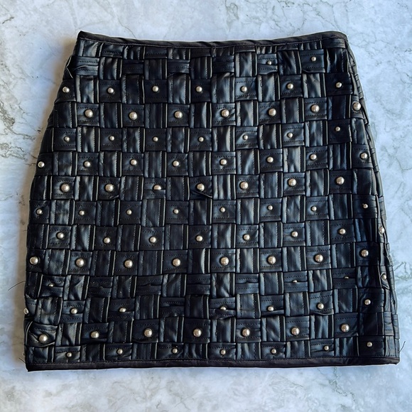 Fashion Nova Dresses & Skirts - FASHION NOVA | Caged faux leather studded mini skirt